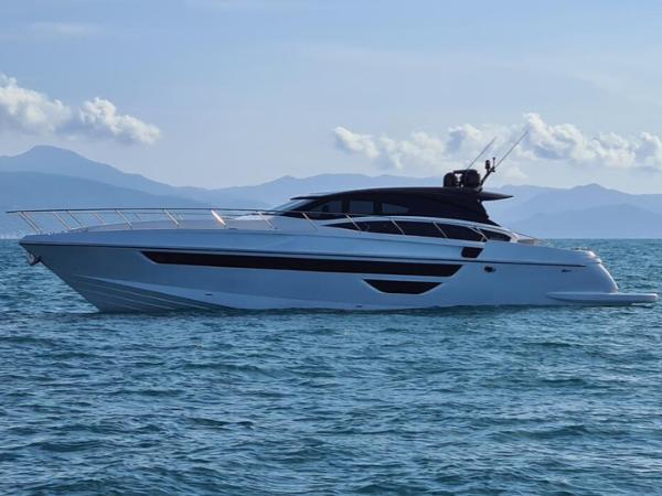 Rizzardi INsix 2020 Rizzardi INsix yacht cruising on calm blue waters with mountainous backdrop.