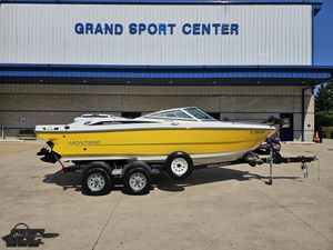 Monterey 196MFS 2015 Monterey 196MFS boat in yellow, parked at Grand Sport Center.