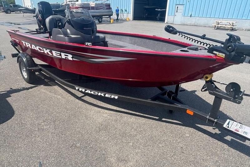 Tracker SG V16 SC Red 2026 Tracker SG V16 SC boat on trailer, parked outdoors.