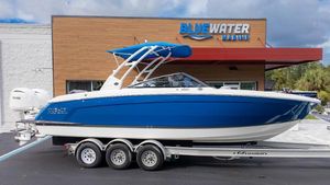 Cobalt R8 Outboard 2025 Cobalt R8 Outboard boat on trailer at Bluewater Marine dealership.