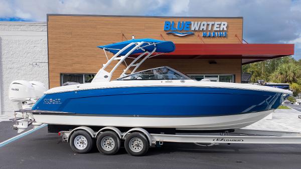 Cobalt R8 Outboard 2025 Cobalt R8 Outboard boat on trailer at Bluewater Marine dealership.