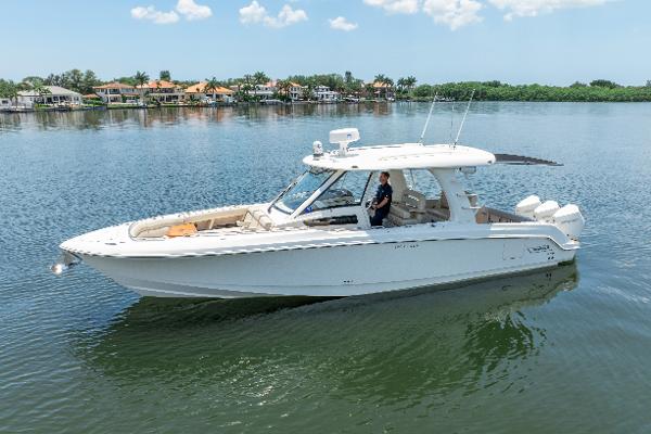 Boston Whaler 350 Realm 2021 Boston Whaler 350 Realm boat on calm water, clear sky background.