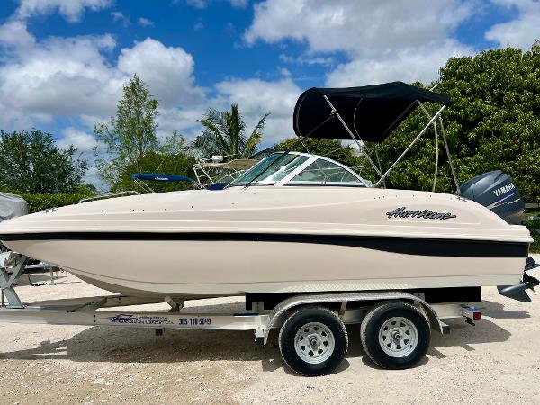 Hurricane 194 2002 Hurricane 194 boat on trailer with Yamaha outboard motor.
