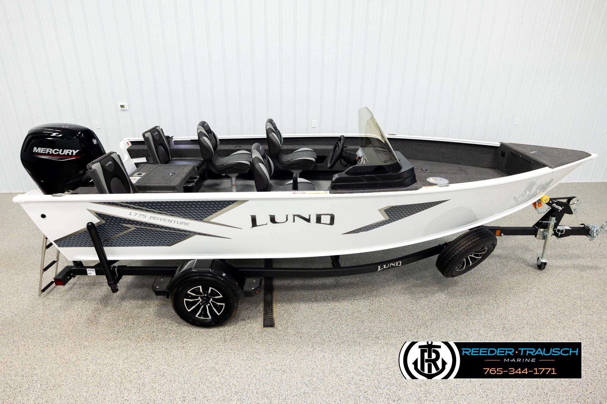 Lund 1775 Adventure SS 2026 Lund 1775 Adventure SS boat with Mercury engine on display in showroom.