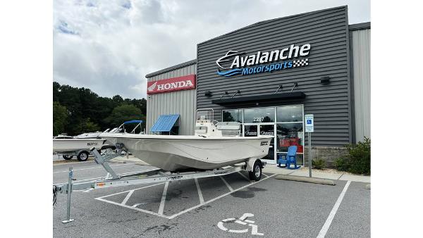 Carolina Skiff 21 LS 2025 Carolina Skiff 21 LS boat on trailer at Avalanche Motorsports dealership.