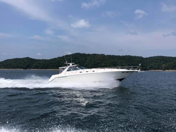 Sea Ray 500 Sundancer 1997 Sea Ray 500 Sundancer cruising on open water.