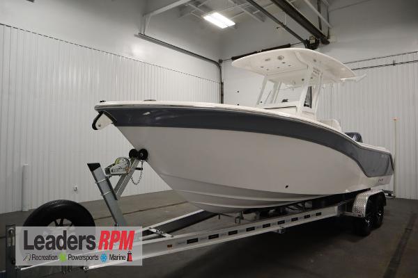 Sea Fox 248 Commander 2025 Sea Fox 248 Commander boat on trailer in indoor showroom.
