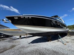 Formula 350 Crossover Bowrider 2015 Formula 350 Crossover Bowrider boat on stands, clear sky background.