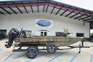 Tracker Grizzly 1756 T Marsh 2026 Tracker Grizzly 1756 T Marsh boat on trailer outside Berkeley Outdoors.