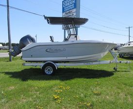 Robalo R180 Center Console 2025 Robalo R180 Center Console boat on trailer, displayed outdoors.