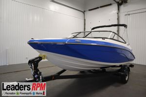 Yamaha Boats SX195 2025 Yamaha Boats 195 SX in showroom, blue and white design, on trailer.