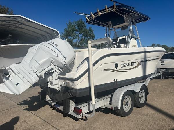 Century 2400 Center Console 2006 Century 2400 Center Console boat on trailer with Yamaha outboard motor.