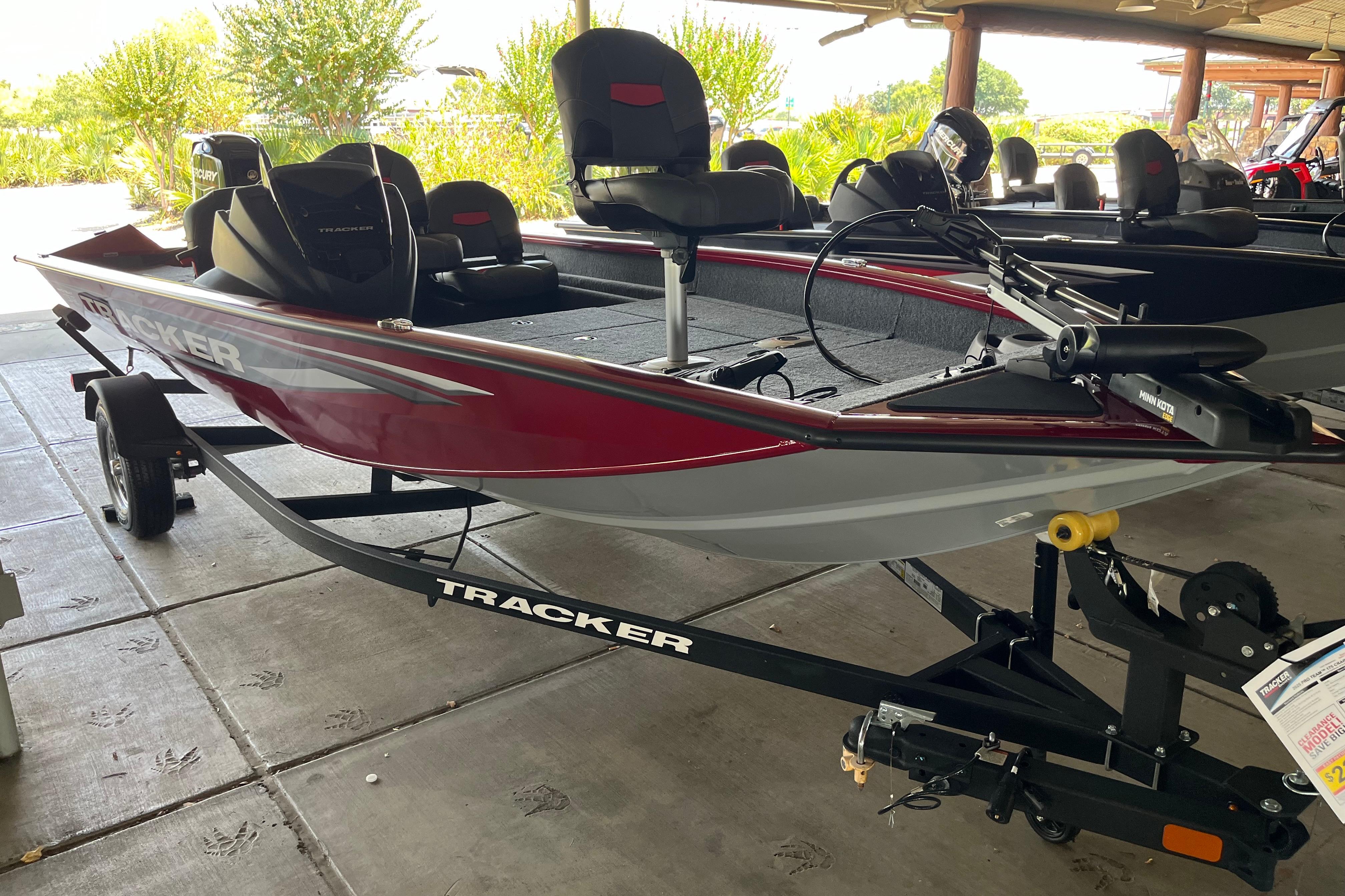 Tracker Pro Team 175 Crappie Edition 2025 Tracker Pro Team 175 Crappie Edition boat on trailer, red and gray design.