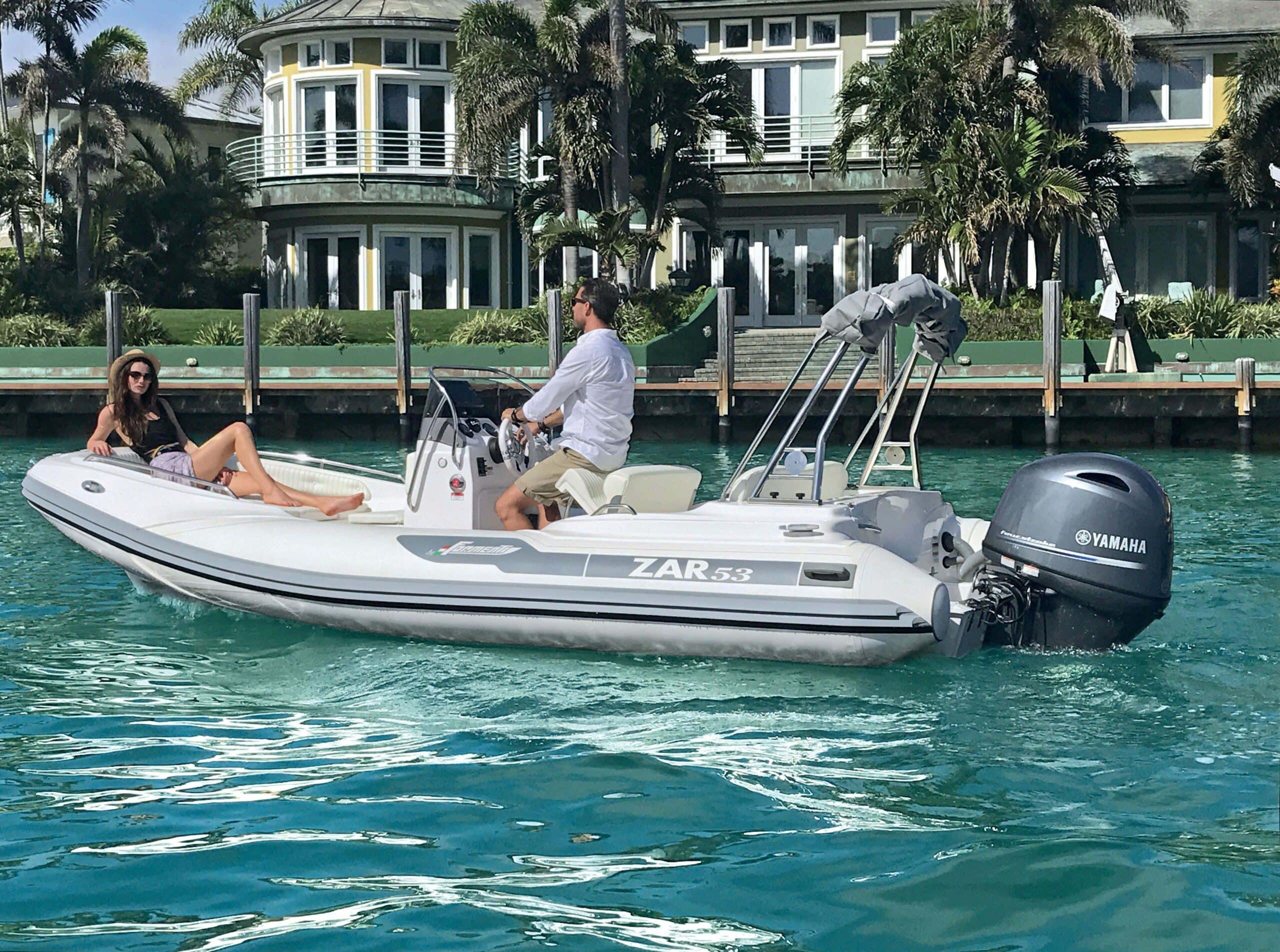 Zar Formenti ZAR Classic 2025 Zar Formenti ZAR Classic boat cruising near waterfront home, featuring Yamaha engine.