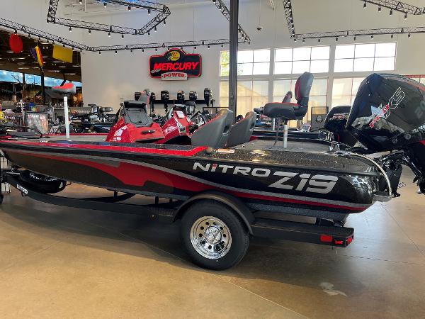 Nitro Z19 2025 Nitro Z19 boat in showroom, featuring sleek design and Mercury engine.