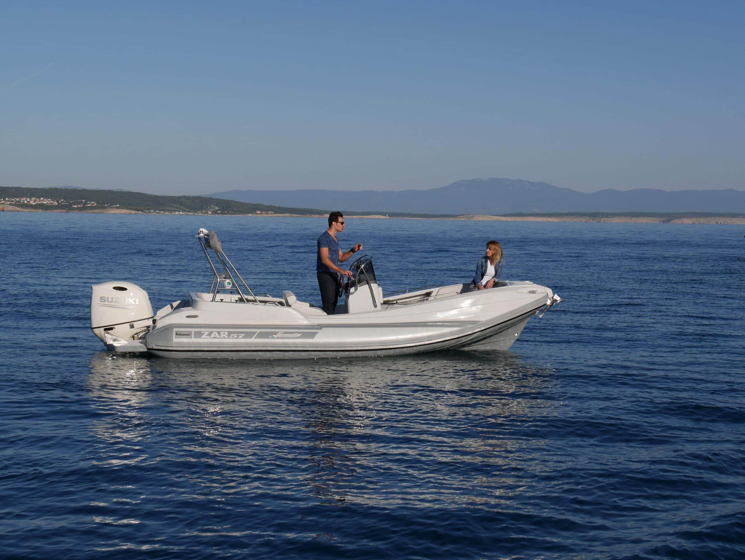 Zar Formenti ZAR Classic 2025 Zar Formenti ZAR Classic boat on calm sea with two people onboard.