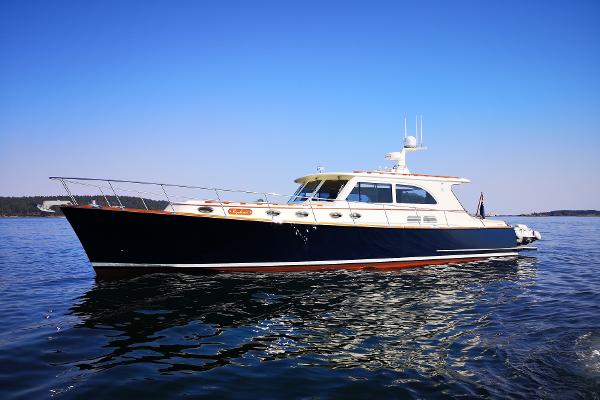Vicem 54 Classic 2006 Vicem 54 Classic yacht on calm water under clear blue sky.