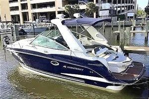 Monterey 260 SCR 2013 Monterey 260 SCR boat docked at marina, featuring sleek design and modern amenities.