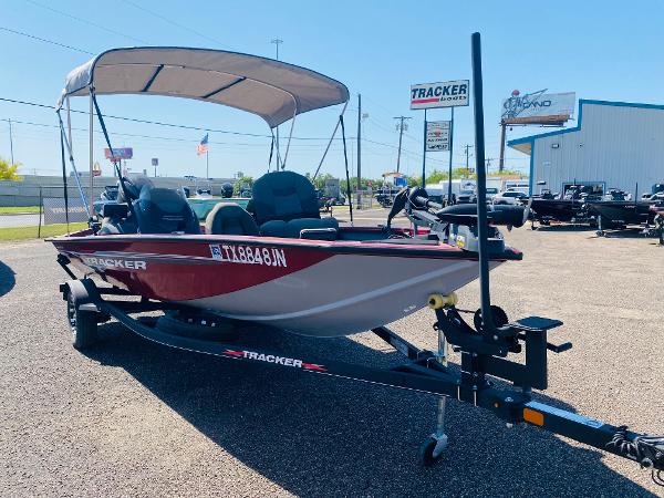 Tracker Pro Team 175 TXW Tournament Edition 2021 Tracker Pro Team 175 TXW Tournament Edition boat with canopy on trailer in dealership lot.