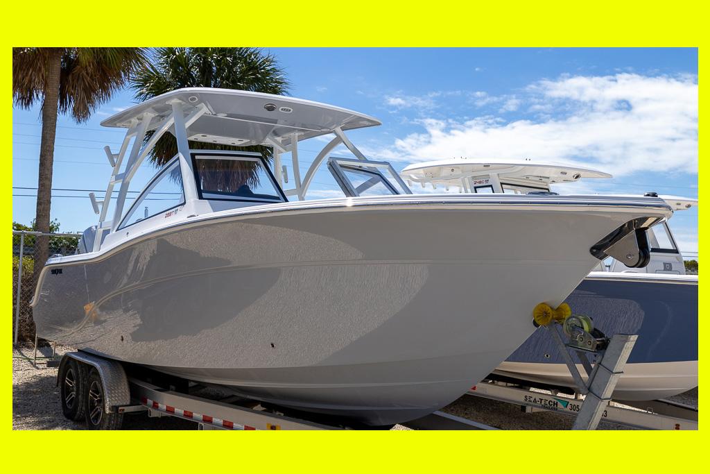 Sea Fox 288 Traveler 2025 Sea Fox 288 Traveler boat on trailer, under clear blue sky.