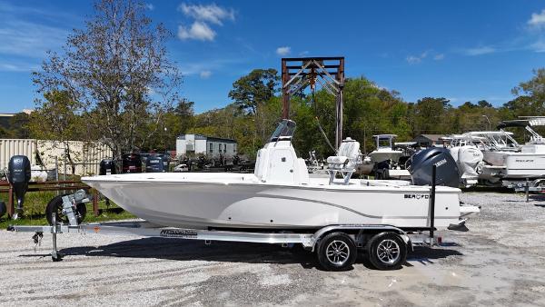 Sea Fox 231 Bay Fox 2025 Sea Fox 231 Bay Fox boat on trailer, parked outdoors under clear blue sky.