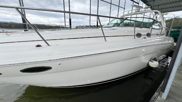Sea Ray 380 Sundancer 2001 Sea Ray 380 Sundancer yacht docked in a marina, side view.