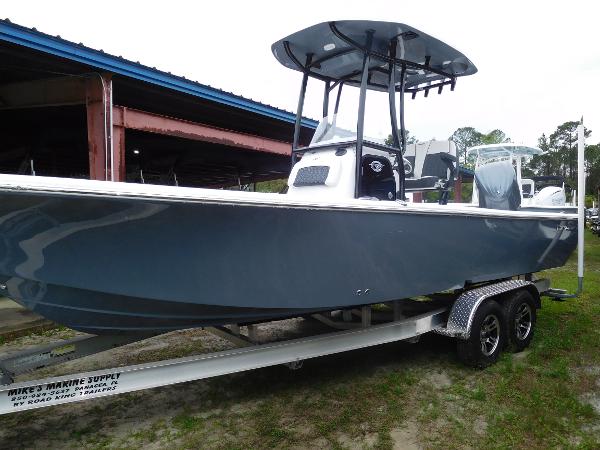 Tidewater 2300 Carolina Bay 2024 Tidewater 2300 Carolina Bay boat on trailer, side view.