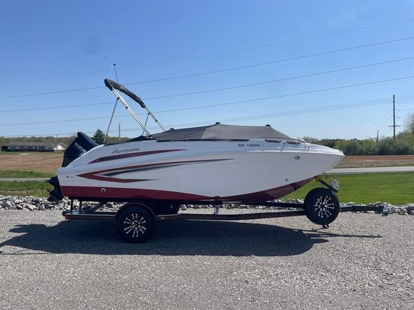 Hurricane SS 192 RL OB 2022 Hurricane SS 192 RL OB boat on trailer, parked outdoors under clear sky.