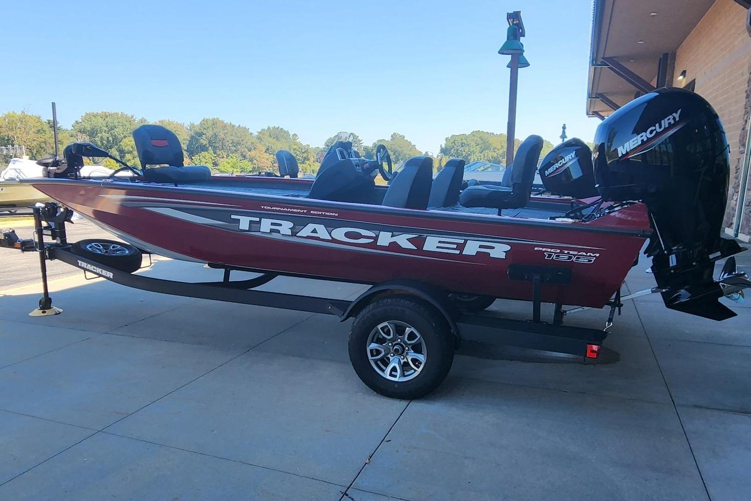 Tracker Pro Team 195 Tournament Edition 2025 Tracker Pro Team 195 Tournament Edition boat on trailer, parked outdoors.
