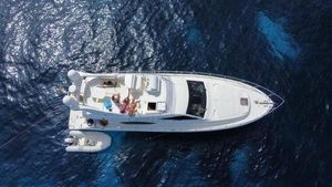 Ferretti Yachts 550 Aerial view of 2006 Ferretti Yachts 550 cruising on deep blue ocean waters.