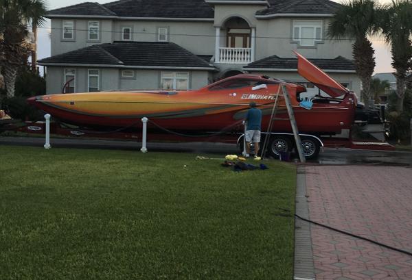Eliminator 36 Daytona Coupe 2007 Eliminator 36 Daytona Coupe speedboat on trailer in front of a house.