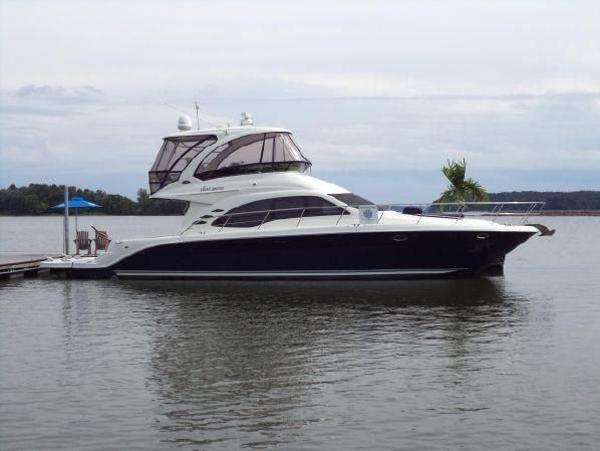 Sea Ray 500 Sedan Bridge Fresh Water 2005 Sea Ray 500 Sedan Bridge yacht docked on calm water.