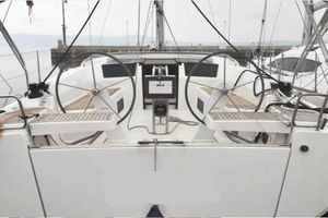 Hanse 418 2019 Hanse 418 yacht cockpit with dual steering wheels and navigation equipment.