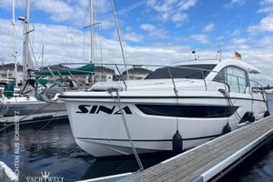 Sealine C390 2020 Sealine C390 yacht docked at marina under blue sky.