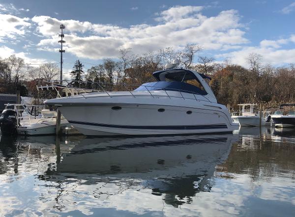 Formula 37 PC 2002 Formula 37 PC yacht docked in a serene marina.