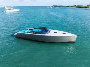 VanDutch 55 VanDutch 55 yacht, 2015 model, sleek design, anchored in turquoise waters.