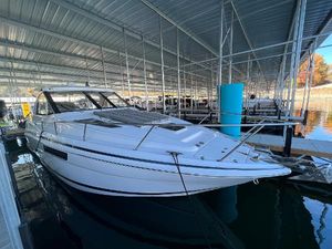 Regal 35 Sport Coupe 2017 Regal 35 Sport Coupe docked in a covered marina.