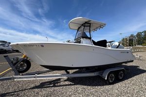 Sea Fox 226 Center Console 2012 Sea Fox 226 Center Console boat on trailer under clear blue sky.