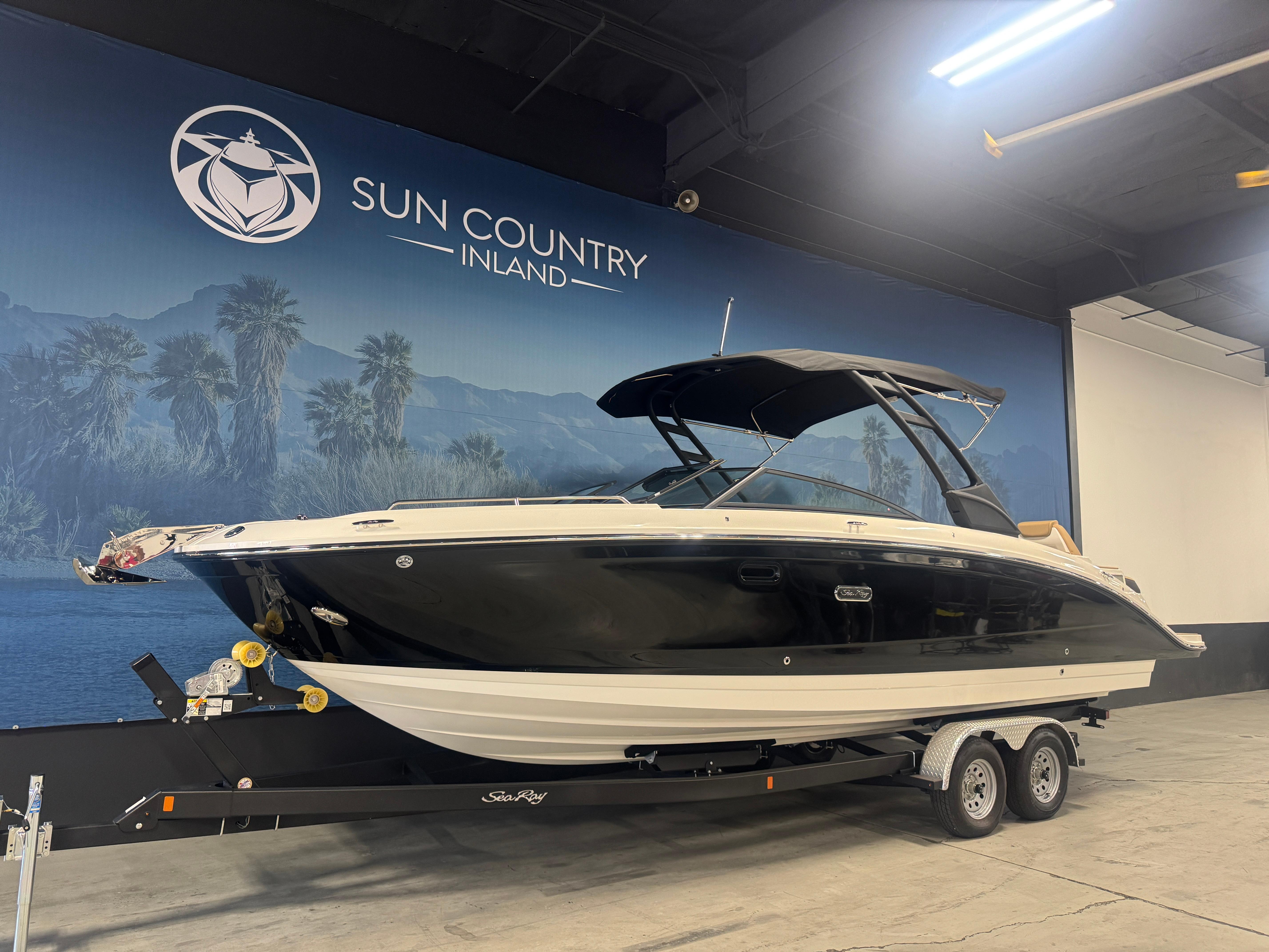 Sea Ray SDX 290 2026 Sea Ray SDX 290 boat on trailer at Sun Country Inland showroom.