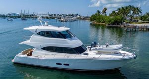 Maritimo M50 2015 Maritimo M50 yacht cruising in a scenic tropical marina.