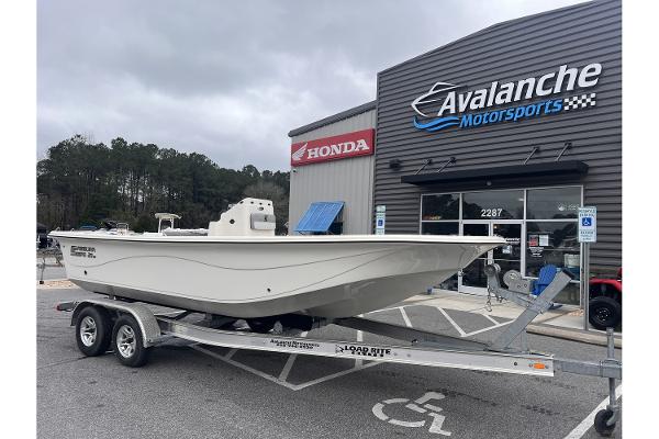 Carolina Skiff 21 LS 2024 Carolina Skiff 21 LS boat on trailer at Avalanche Motorsports dealership.