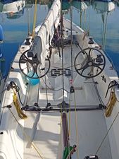 Custom TWELVE OD Sailboat cockpit with dual steering wheels, Custom TWELVE OD model, 2010, docked in marina.