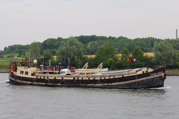 A Barge at Large: Blundering around Europe in our old Dutch boat (The 'At  Large' series Book 2) See more