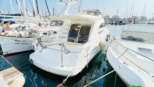 Sealine 360 Statesman 1995 Sealine 360 Statesman yacht docked in a marina, surrounded by other boats.
