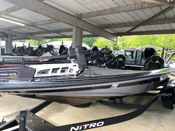 Nitro Z21 XL Pro 2024 Nitro Z21 XL Pro boat on trailer in covered storage area.