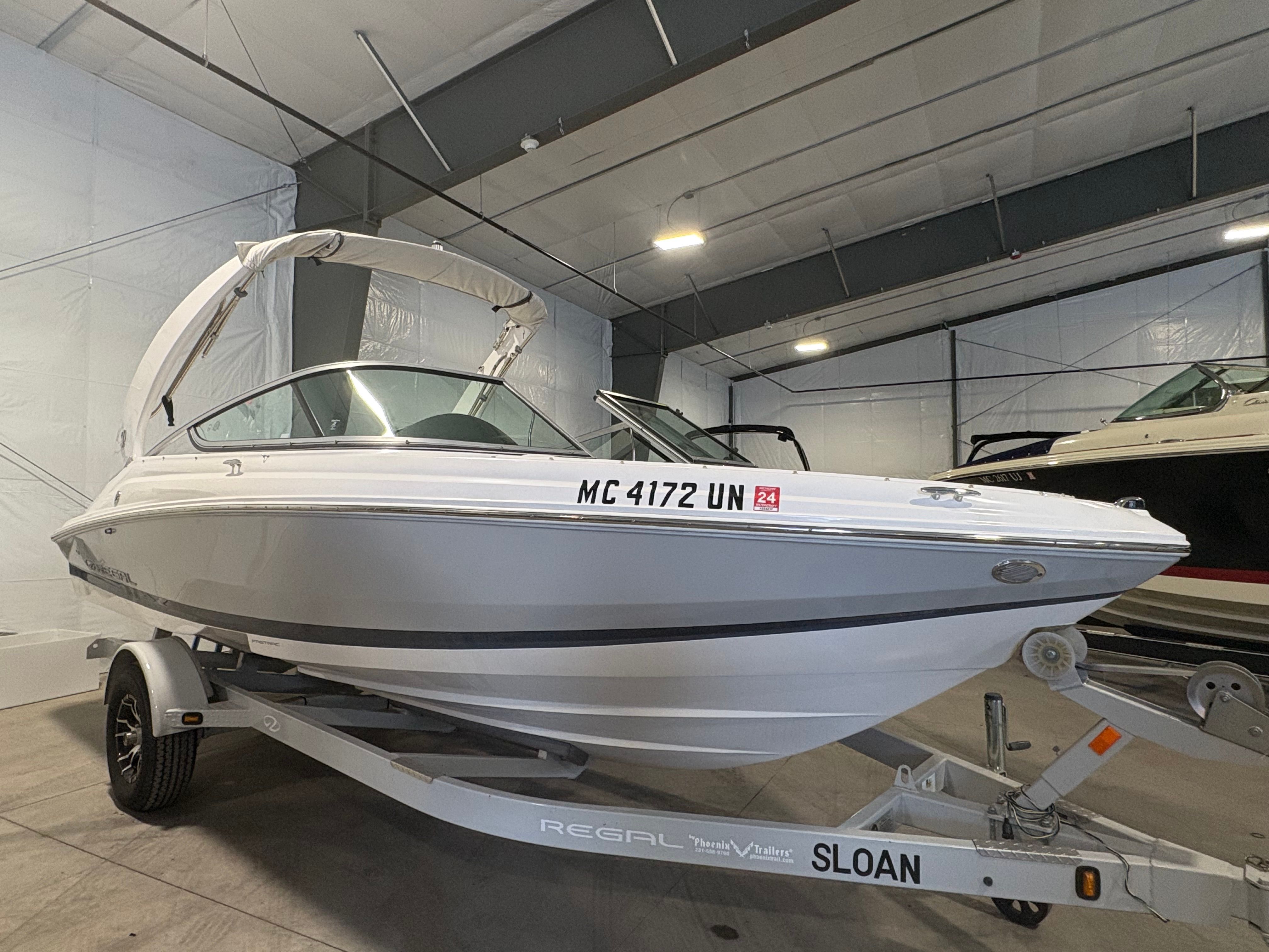 Regal 2000 ES 2021 Regal 2000 ES boat on trailer in indoor storage facility.