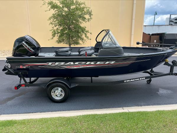 Tracker Pro Guide V-16 WT 2025 Tracker Pro Guide V-16 WT boat on trailer, parked outdoors.