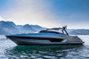 Riva 56' Rivale 2021 Riva 56' Rivale yacht on serene water with mountainous backdrop.