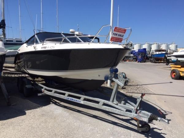 Quicksilver Activ 645 Cruiser 2015 Quicksilver Activ 645 Cruiser boat on trailer, for sale at marina.