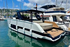 Cranchi A46 Luxury Tender 2024 Cranchi A46 Luxury Tender yacht docked in a marina, showcasing sleek design and elegance.